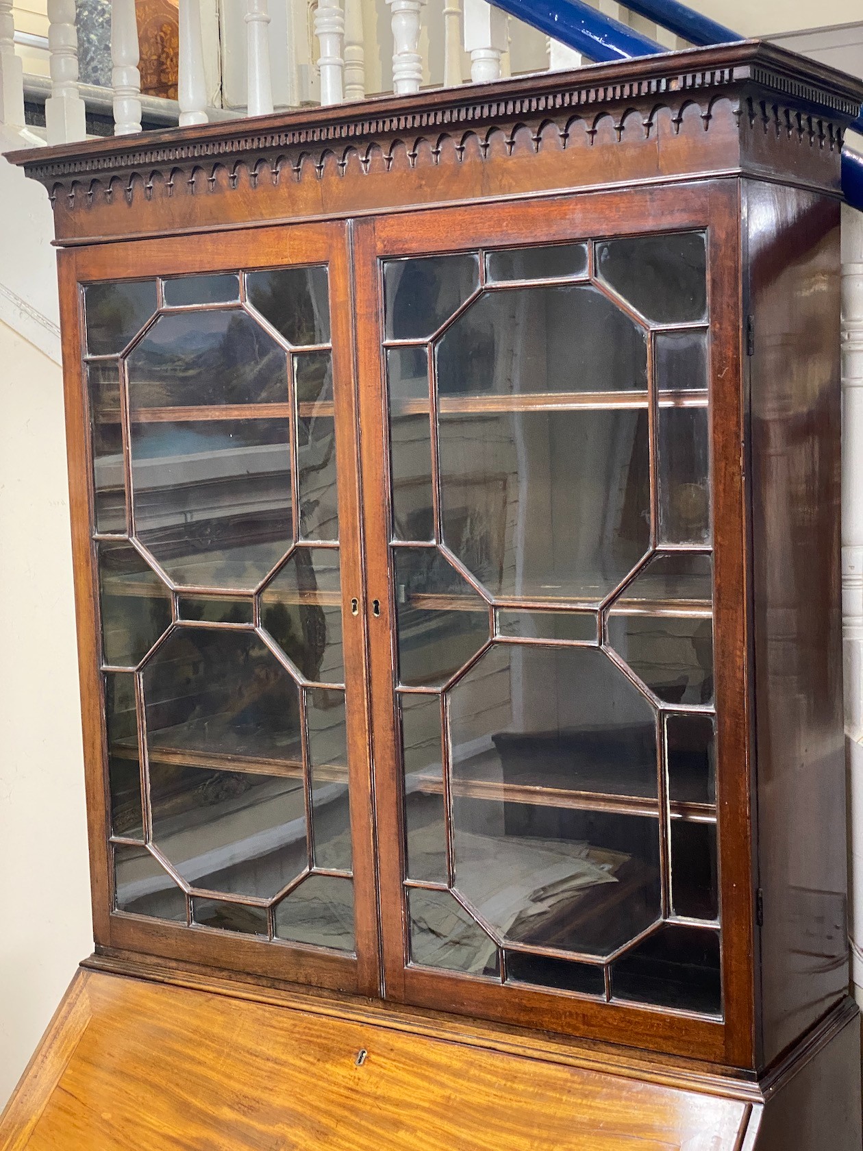 A George III mahogany bureau bookcase, width 106cm, depth 58cm, height 225cm